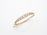 un bracelet en or jaune serti d'opales et de diamants