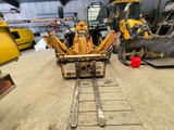 a picture of a construction vehicle parked in a garage