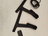 a remote control and a remote control on a bed