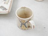 a cup that has a tea bag in it