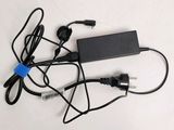 a charger that is plugged into a laptop