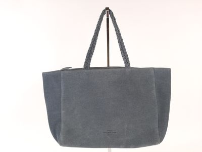 Petite Mendigote sac cabas en cuir retourné teinté bleu .