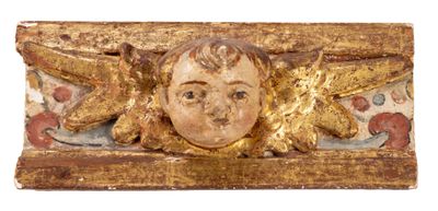 a picture of a gold sculpture of a child with a starfish on it