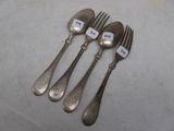 four forks and a spoon with a price tag on them