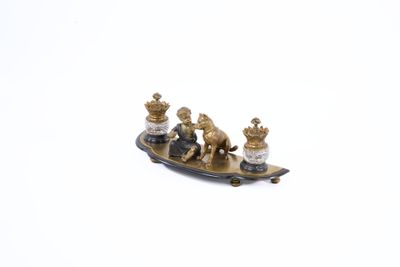 figurine of a boat with three lions on it