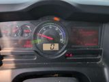 the dashboard of a car with a speedometer and gauges on it