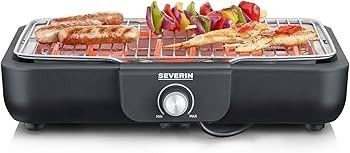 un barbecue sur lequel il y a beaucoup de nourriture