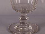 a glass that is sitting on top of a table
