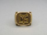 a gold ring with the letter y on it