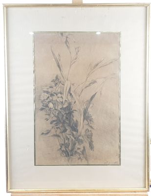 painting of a bouquet of flowers in a frame on a table