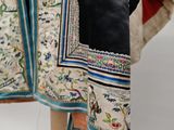an image of a jacket on a mannequin stand