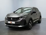 vue de face d'un SUV de couleur sombre garé dans une pièce