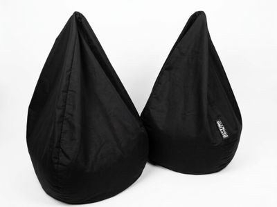 a pair of black bean bags sitting on top of each other