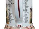 a white and red mug with a red handle on it