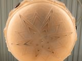 a light that is hanging from the ceiling in the room