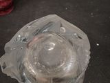 a clear glass container with a liquid inside of it