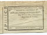 un gros plan d'un morceau de papier sur lequel est apposé un timbre