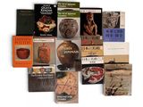 a lot of books that are sitting on a table