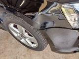 a picture of a car that has a denting on it