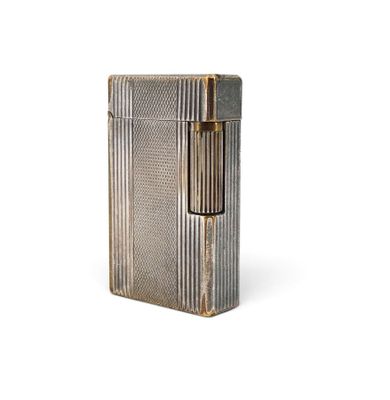 an image of a silver lighter sitting on top of a white surface