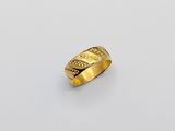 a gold ring with a cross on it
