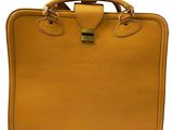 a brown briefcase with a handle and handles on a white background