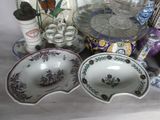 a lot of dishes that are sitting on a table