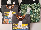 three men ' s t - shirts with different designs on them