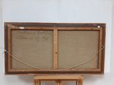 an old wooden easel with a chalkboard on top of it