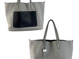 a pair of two gray and black handbags on a white background