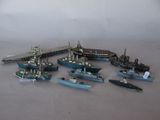a lot of toy boats that are sitting on a table