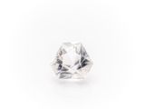 a close up of a white diamond on a white background
