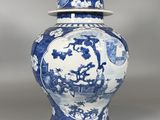 pot en porcelaine bleue et blanche avec couvercle, orné d'un paysage