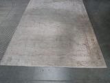 a large rug on the floor in a room