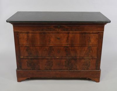 an antique chest of drawers with a marble top