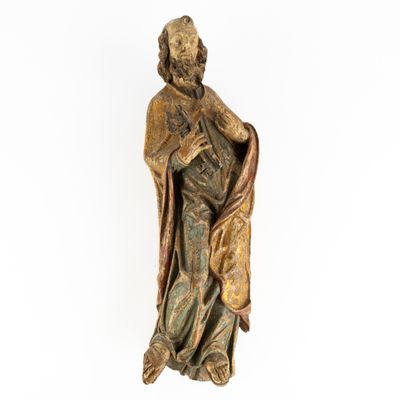 an image of a statue of a man holding a bag