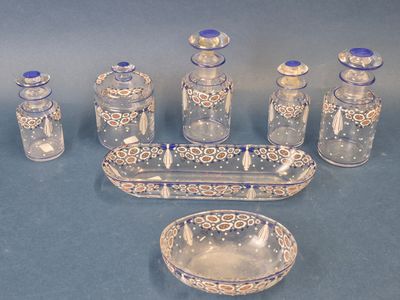 a lot of glass items that are sitting on a table