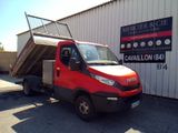 a red truck that is parked in front of a building