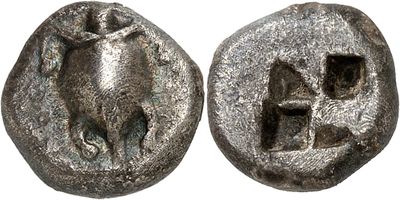 a close up of a coin with a horse on it