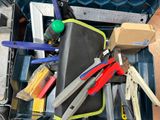 many tools in a toolbox with a ruler and a ruler