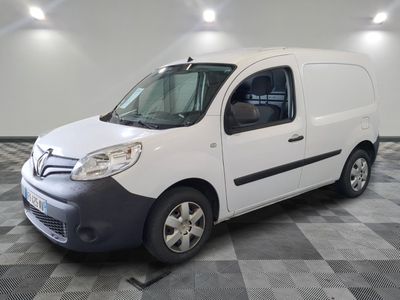 a picture of a white van parked on a checkered floor
