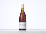 a bottle of wine that is sitting on a table