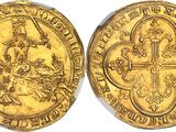 a gold coin with a cross on the front and an image of a man on a horse on the back