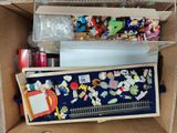 a box with a bunch of toys inside of it