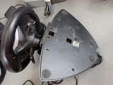 a steering wheel and a steering wheel on a table