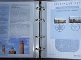un livre ouvert sur lequel figure l'image d'un phare