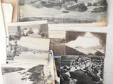 many old photographs on the wall of this room