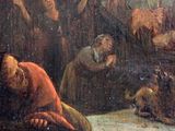 a painting of a man sitting on the ground in front of a group of people