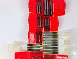 a lot of red and black screws in a red case