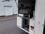 an image of a small kitchen in a trailer